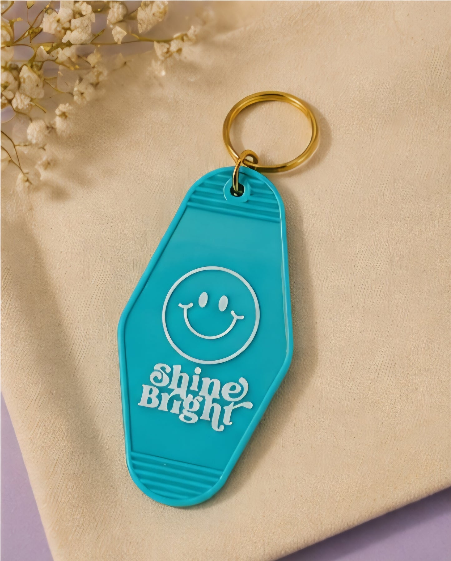 Shine Bright Smiley Motel Keychain